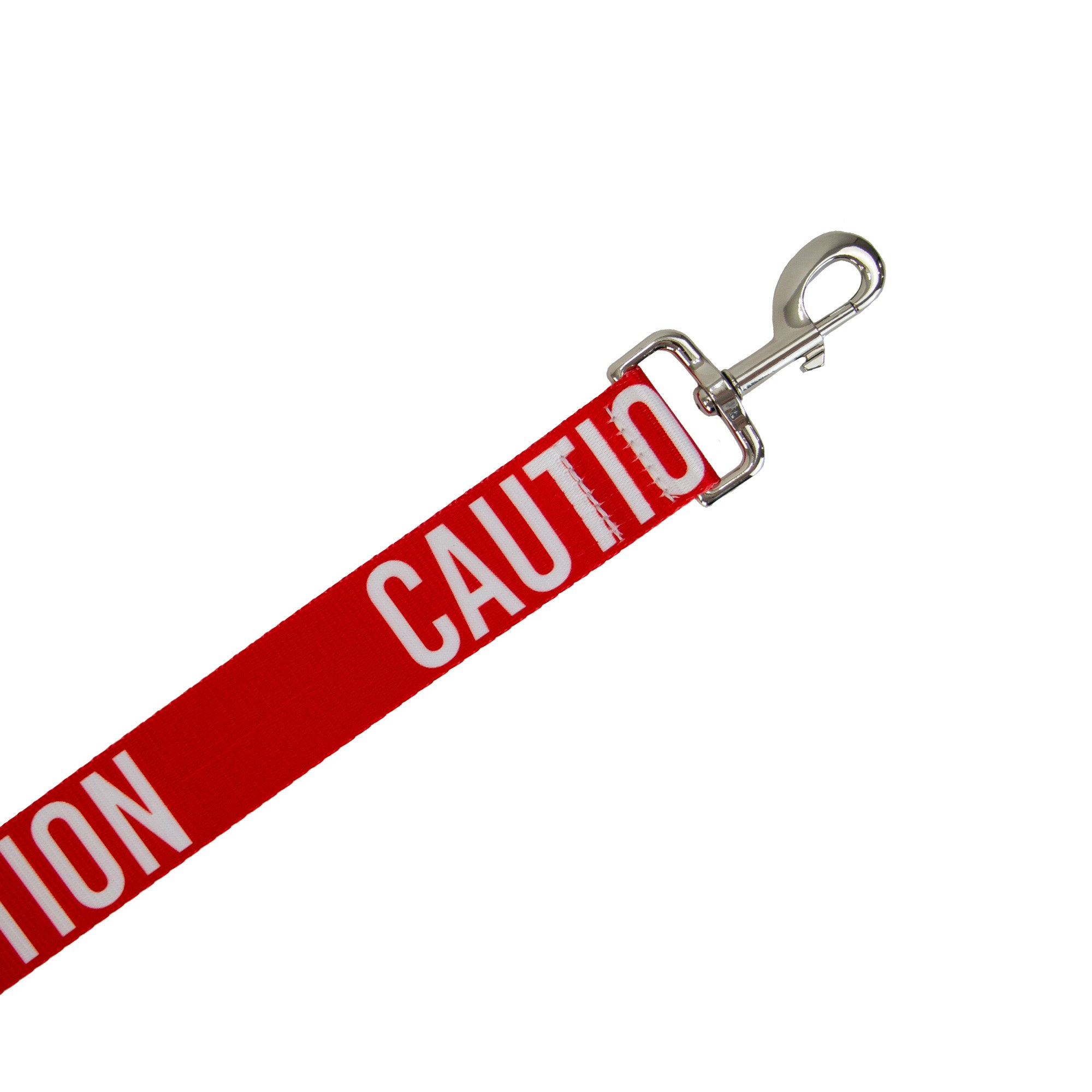 Close-up of the CAUTION lettering and trigger hook on the red 40mm lead