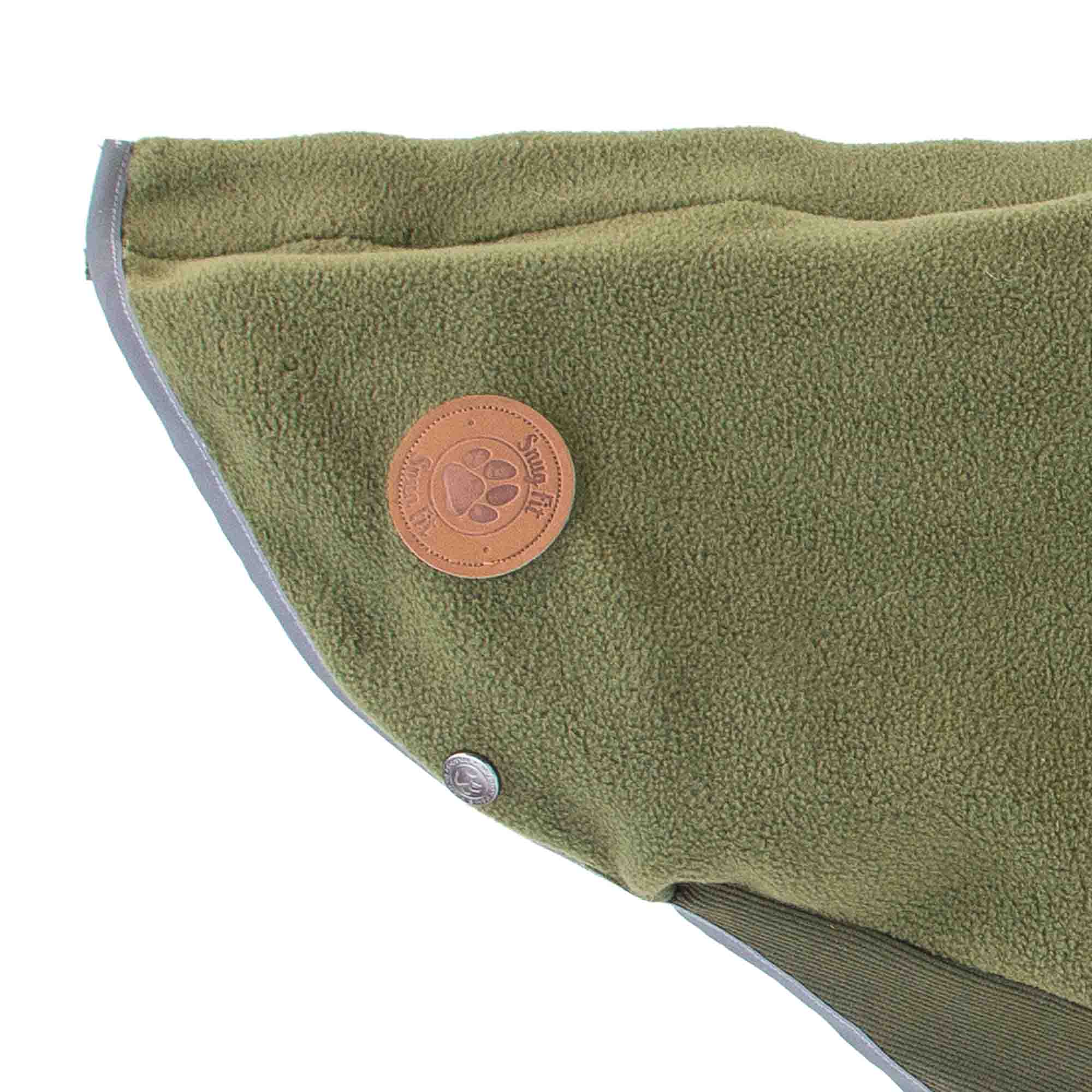 Detail of the khaki Snug Fit fleece showing the badge and reflective edging