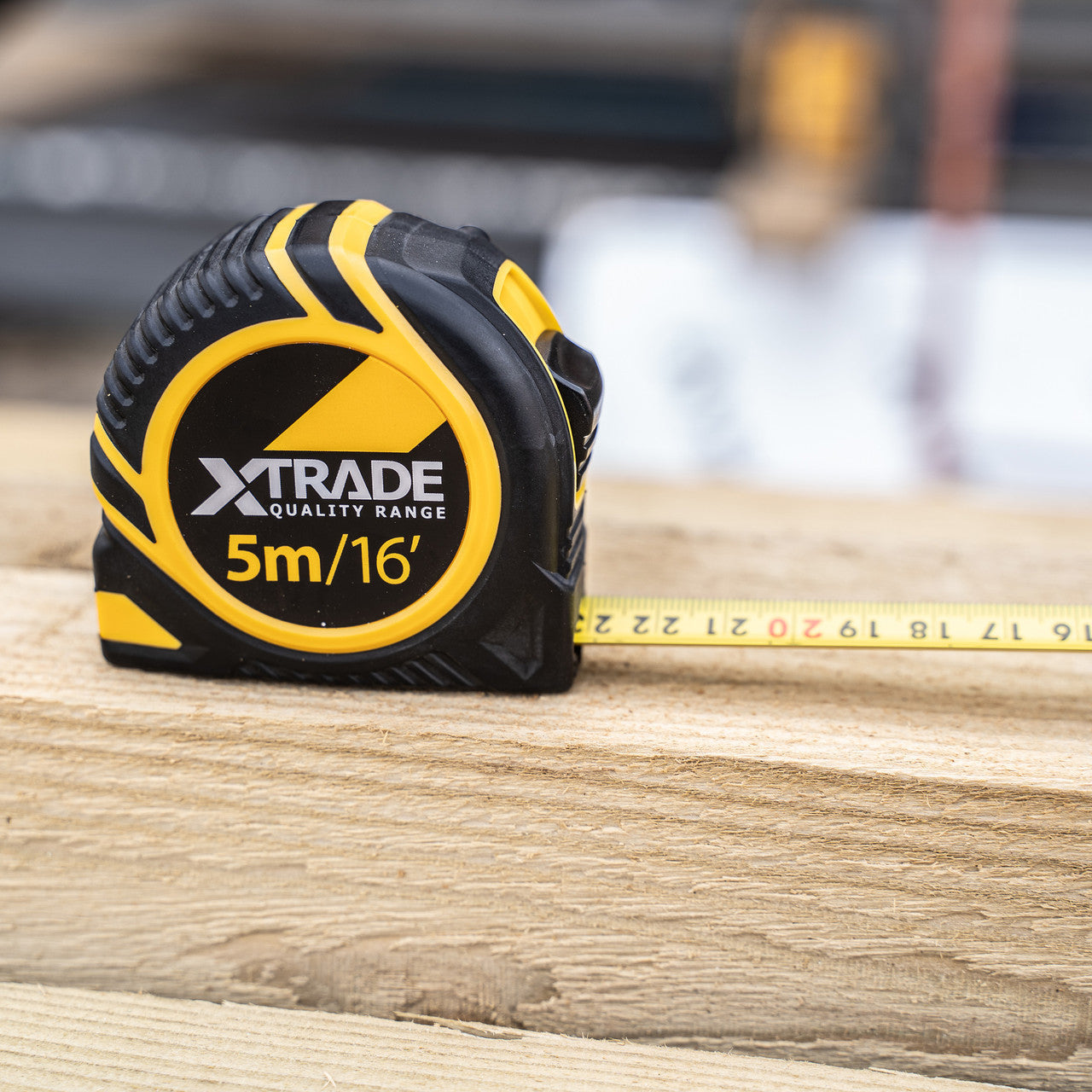 XTrade 5m / 16ft tape measure measuring along a length of timber